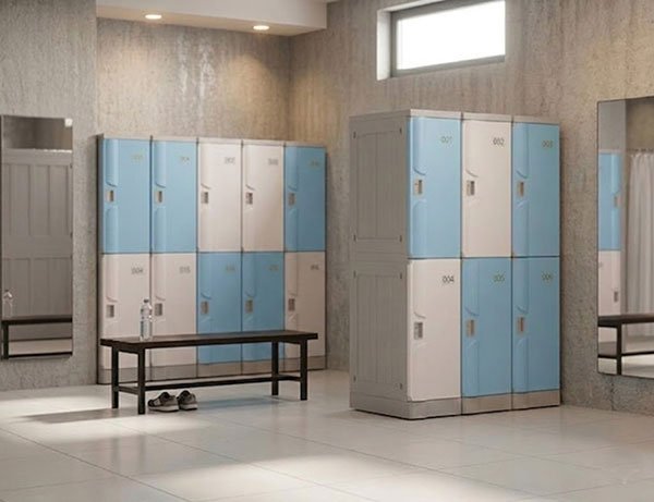 Blue, white and grey ABS plastic lockers installed in a spa changing room, rustproof and moisture resistant for wet areas